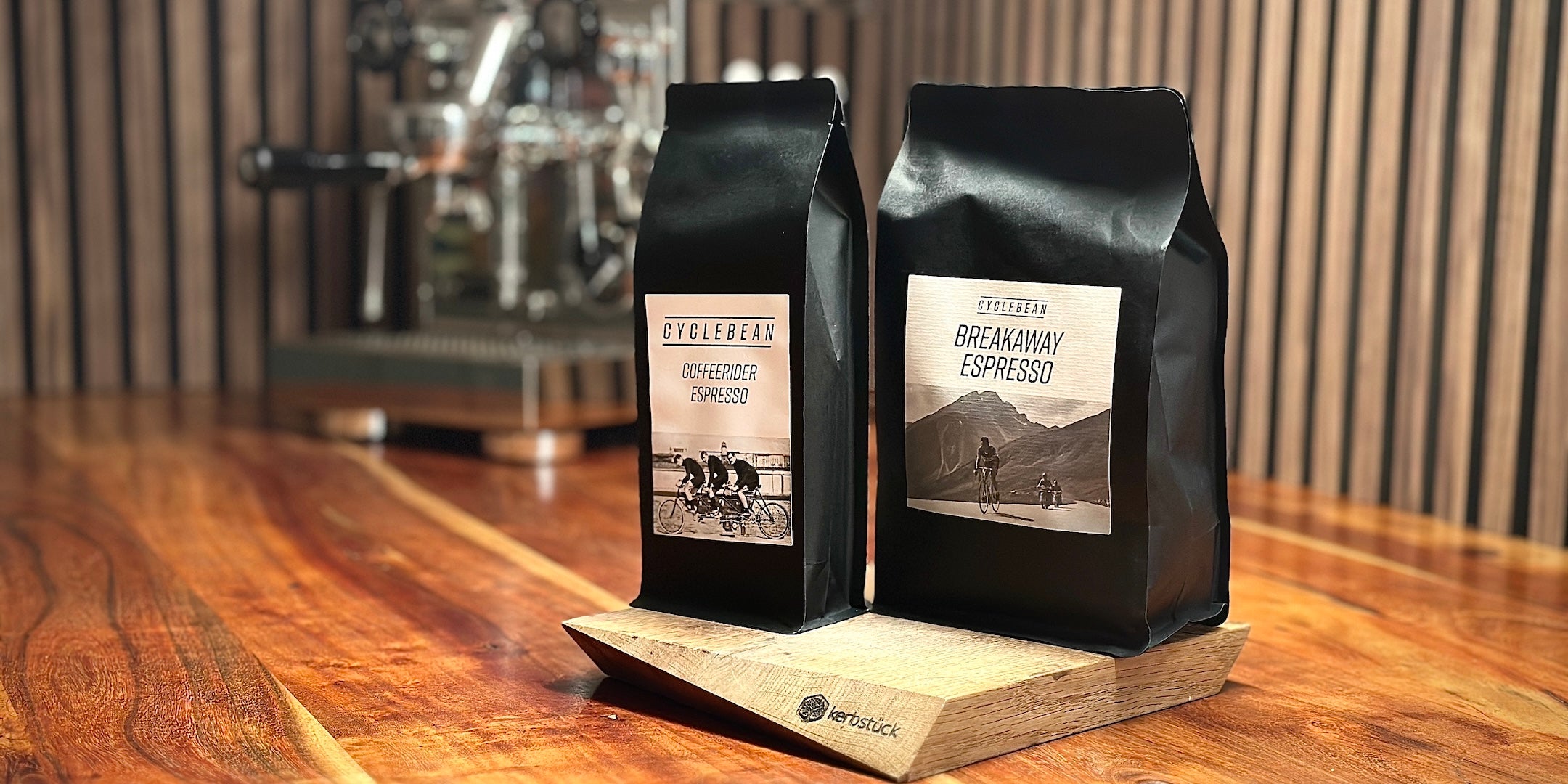 Zwei Espresso-Packungen mit Fahrrad Motiven